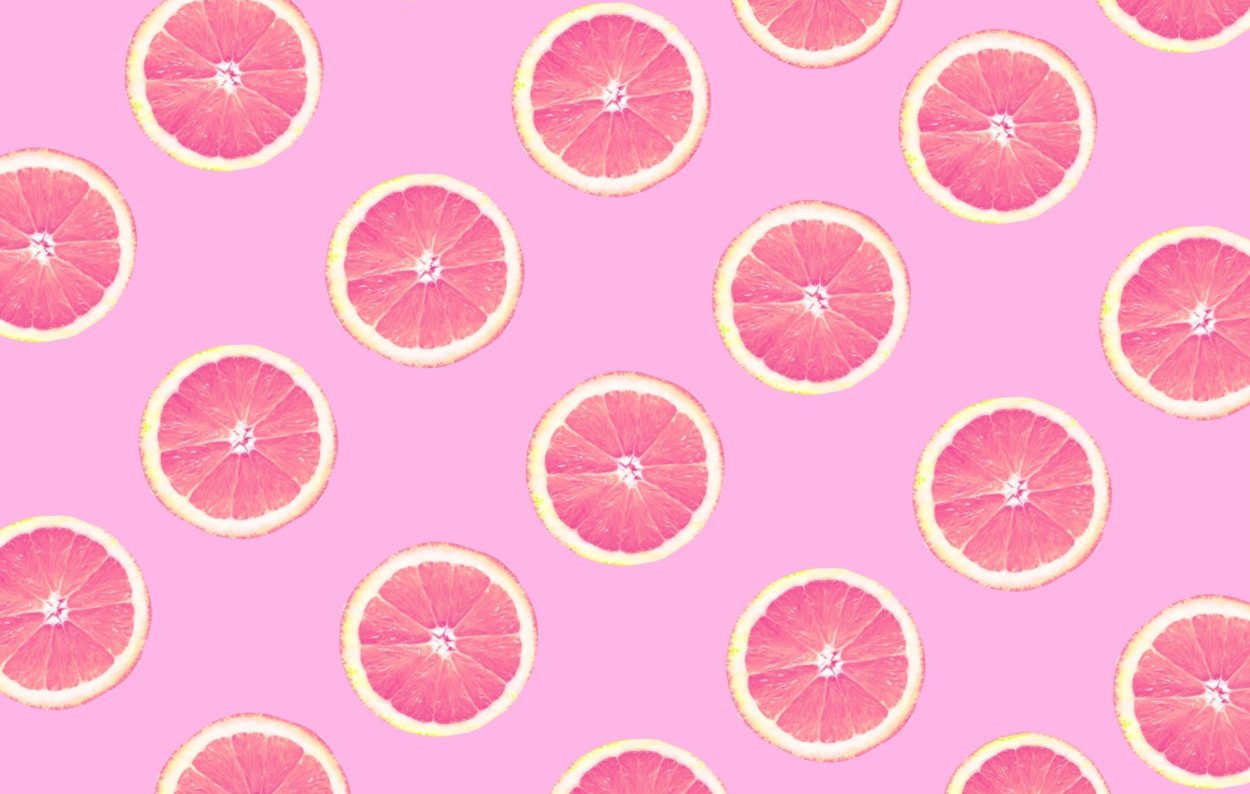 Фрукты на розовом фоне