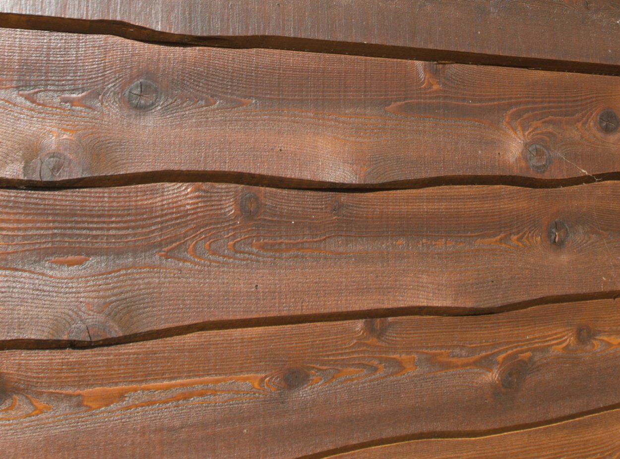 Отделка стен необрезными досками