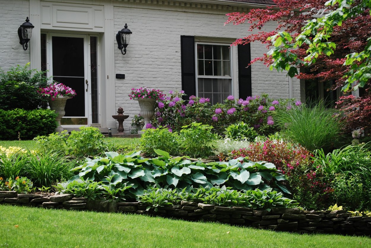 Палисадники клумбы лужайки