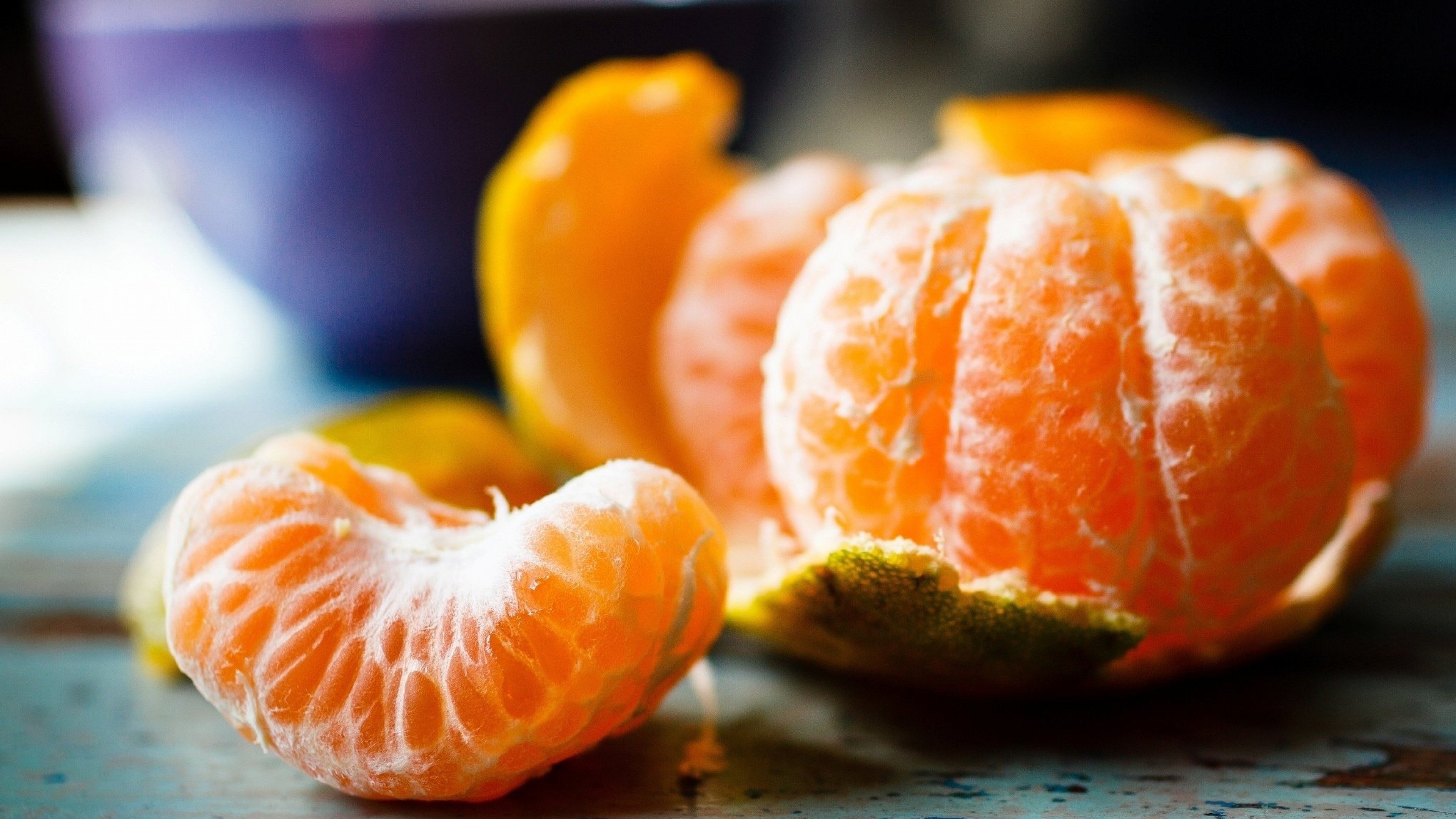 Фото мандаринки. Кожуры мандарина (Citrus reticulata). Мандарин скрещенный с апельсином. Мандарины боло. Гибрид мандарина.