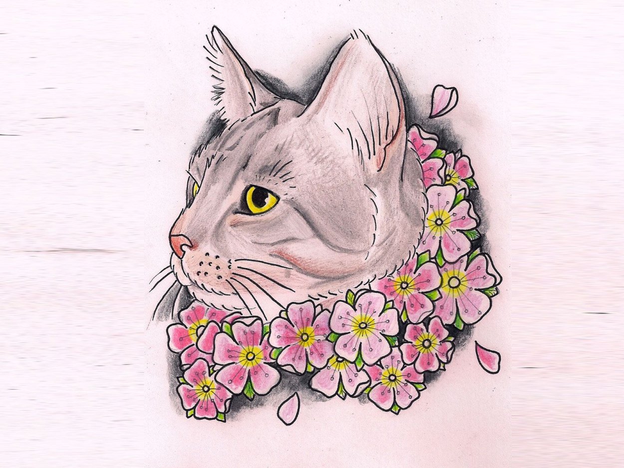 Рыжий кот в цветах