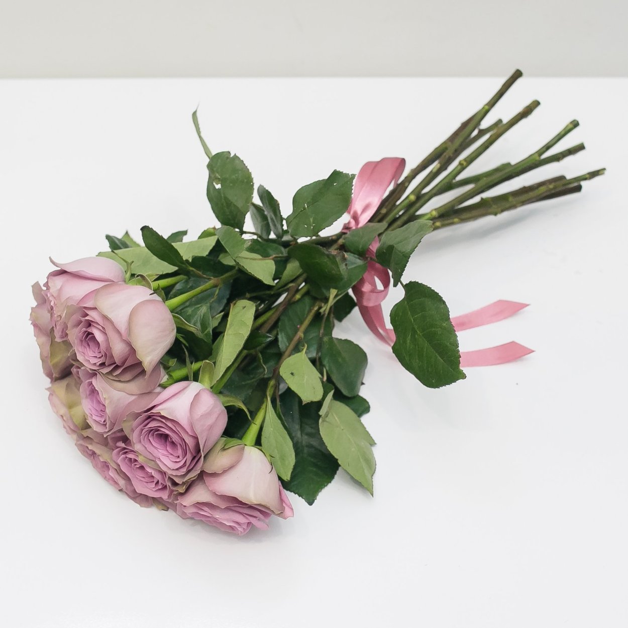 Роза в целлофане